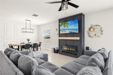 This beautifully designed four-bedroom home offers an on Palmetto-Pine Country Club in Florida - for sale on GolfHomes.com, golf home, golf lot