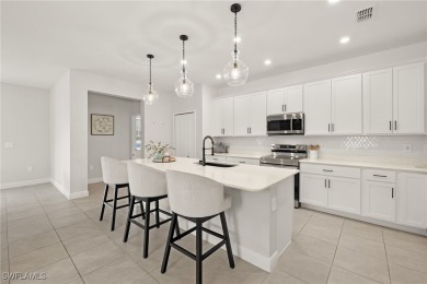 This beautifully designed four-bedroom home offers an on Palmetto-Pine Country Club in Florida - for sale on GolfHomes.com, golf home, golf lot