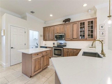 Experience modern luxury in this beautifully renovated residence on Shadow Wood Country Club in Florida - for sale on GolfHomes.com, golf home, golf lot