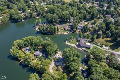 Enjoy life on the water with this 3 bedroom, 2.5 bath, lakefront on Foxcliff Golf Club in Indiana - for sale on GolfHomes.com, golf home, golf lot