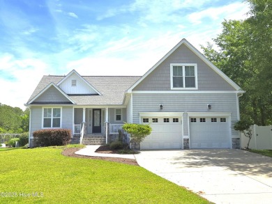 Experience lakefront living in this beautifully updated home on on Harbour Point Golf Club in North Carolina - for sale on GolfHomes.com, golf home, golf lot