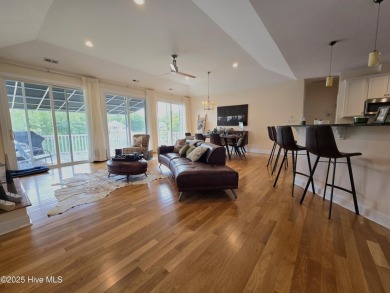 Experience lakefront living in this beautifully updated home on on Harbour Point Golf Club in North Carolina - for sale on GolfHomes.com, golf home, golf lot
