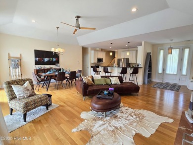 Experience lakefront living in this beautifully updated home on on Harbour Point Golf Club in North Carolina - for sale on GolfHomes.com, golf home, golf lot