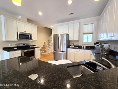 Experience lakefront living in this beautifully updated home on on Harbour Point Golf Club in North Carolina - for sale on GolfHomes.com, golf home, golf lot