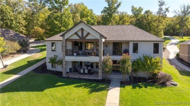 Nestled on a gentle lot in the coveted Porto Cima community on The Club At Porto Cima in Missouri - for sale on GolfHomes.com, golf home, golf lot