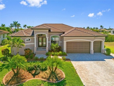 Punta Gorda Isles! Experience luxury living at its finest in on Saint Andrews South Golf Club in Florida - for sale on GolfHomes.com, golf home, golf lot