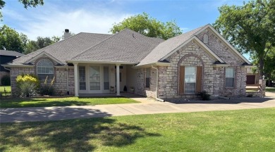 This beautiful  IMMACULATE home is located on the corner of a on Pecan Plantation Country Club in Texas - for sale on GolfHomes.com, golf home, golf lot