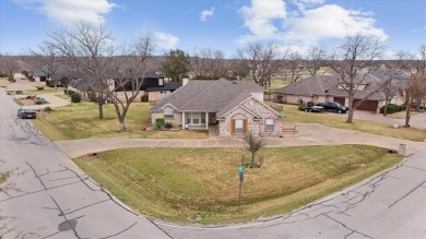 This beautiful  IMMACULATE home is located on the corner of a on Pecan Plantation Country Club in Texas - for sale on GolfHomes.com, golf home, golf lot