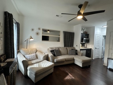 Walk-In Golf front condo with a pond view located  at on Ledgestone Country Club and Golf Course in Missouri - for sale on GolfHomes.com, golf home, golf lot