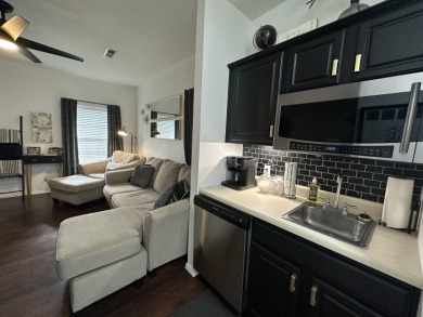 Walk-In Golf front condo with a pond view located  at on Ledgestone Country Club and Golf Course in Missouri - for sale on GolfHomes.com, golf home, golf lot