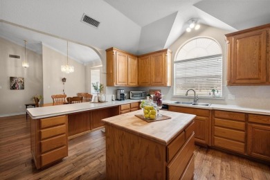 This beautiful  IMMACULATE home is located on the corner of a on Pecan Plantation Country Club in Texas - for sale on GolfHomes.com, golf home, golf lot