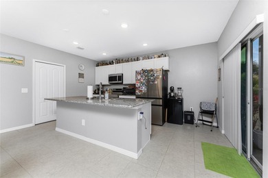 Impressive and spacious 4 Bedroom, 2 Bathroom home with attached on Deep Creek Golf Club in Florida - for sale on GolfHomes.com, golf home, golf lot