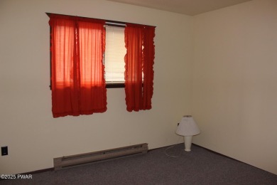 YOUR AFFORDABLE HIDEAWAY IN THE HIDEOUT AWAITS.  This 2 bed 1 on The Hideout Golf in Pennsylvania - for sale on GolfHomes.com, golf home, golf lot
