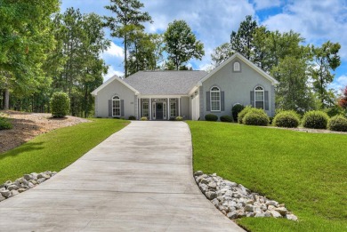 THIS FABULOUS GOLF HOME SITS OVERLOOKING THE 7TH GREEN ON THE on Monticello Golf Club At Savannah Lakes in South Carolina - for sale on GolfHomes.com, golf home, golf lot