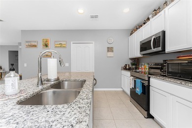 Impressive and spacious 4 Bedroom, 2 Bathroom home with attached on Deep Creek Golf Club in Florida - for sale on GolfHomes.com, golf home, golf lot