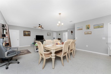 Impressive and spacious 4 Bedroom, 2 Bathroom home with attached on Deep Creek Golf Club in Florida - for sale on GolfHomes.com, golf home, golf lot