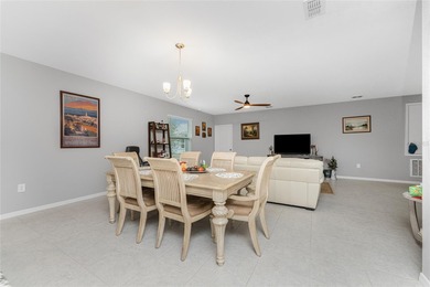 Impressive and spacious 4 Bedroom, 2 Bathroom home with attached on Deep Creek Golf Club in Florida - for sale on GolfHomes.com, golf home, golf lot