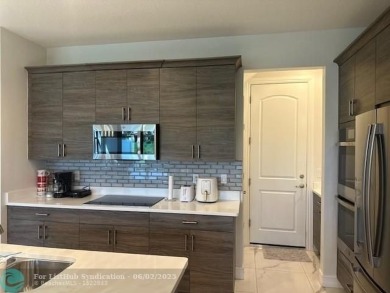 BUILT 2020! GATED RESORT STYLE COMMUNITY WITH LOW HOA! CORNER on Boca Dunes Golf and Country Club in Florida - for sale on GolfHomes.com, golf home, golf lot