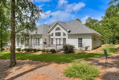 THIS FABULOUS GOLF HOME SITS OVERLOOKING THE 7TH GREEN ON THE on Monticello Golf Club At Savannah Lakes in South Carolina - for sale on GolfHomes.com, golf home, golf lot