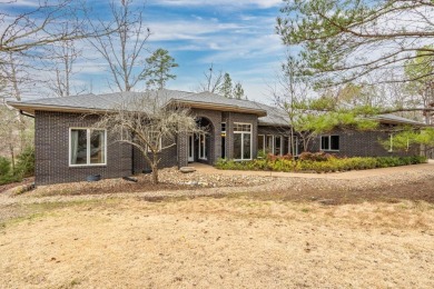 This stately home sits on 221' of Lake Estrella frontage at the on Granada Golf Course in Arkansas - for sale on GolfHomes.com, golf home, golf lot