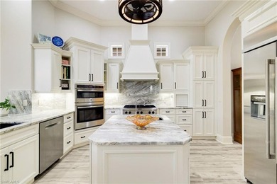 Welcome to an exceptional waterfront retreat offering almost 3 on Miromar Lakes Golf Club in Florida - for sale on GolfHomes.com, golf home, golf lot