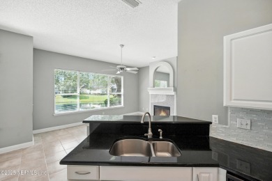 Welcome to your dream home! Nestled in a highly desirable golf on Windsor Parke Golf Club in Florida - for sale on GolfHomes.com, golf home, golf lot
