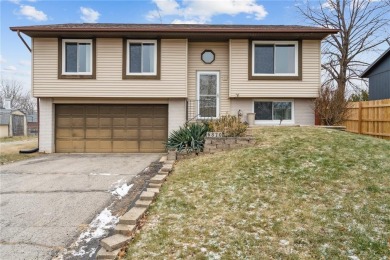 Welcome to your newly vinyl sided dream home off Boyson Road! on St. Andrews Golf Club in Iowa - for sale on GolfHomes.com, golf home, golf lot