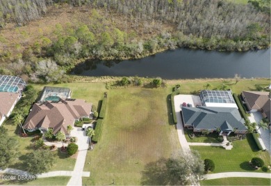 This property is nestled in between one of two famous LPGA golf on LPGA International Golf Course in Florida - for sale on GolfHomes.com, golf home, golf lot