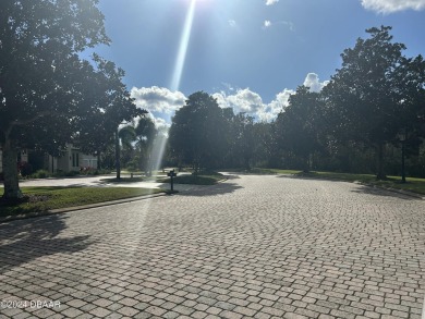 This property is nestled in between one of two famous LPGA golf on LPGA International Golf Course in Florida - for sale on GolfHomes.com, golf home, golf lot