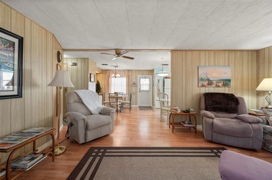 This beautifully maintained 2-bedroom, 2-bath furnished on Kings Gate Golf Club in Florida - for sale on GolfHomes.com, golf home, golf lot