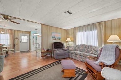 This beautifully maintained 2-bedroom, 2-bath furnished on Kings Gate Golf Club in Florida - for sale on GolfHomes.com, golf home, golf lot