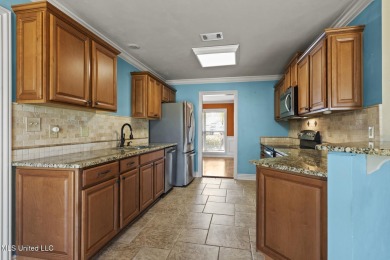 Located on the desirable CARDINAL GOLF COURSE you will enjoy on Diamondhead Country Club in Mississippi - for sale on GolfHomes.com, golf home, golf lot