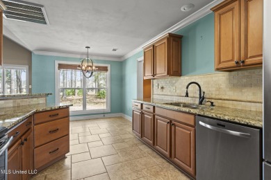 Located on the desirable CARDINAL GOLF COURSE you will enjoy on Diamondhead Country Club in Mississippi - for sale on GolfHomes.com, golf home, golf lot
