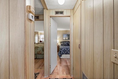 This beautifully maintained 2-bedroom, 2-bath furnished on Kings Gate Golf Club in Florida - for sale on GolfHomes.com, golf home, golf lot