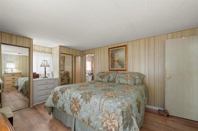 This beautifully maintained 2-bedroom, 2-bath furnished on Kings Gate Golf Club in Florida - for sale on GolfHomes.com, golf home, golf lot