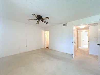 Location, Location, Location! This unit is right by the Pool on Cove Cay Country Club in Florida - for sale on GolfHomes.com, golf home, golf lot