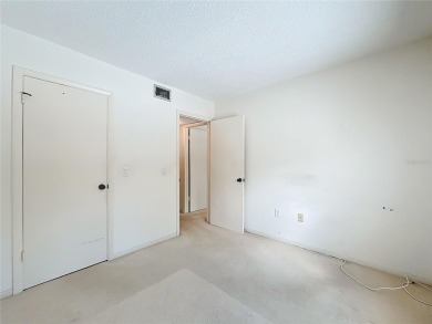 Location, Location, Location! This unit is right by the Pool on Cove Cay Country Club in Florida - for sale on GolfHomes.com, golf home, golf lot