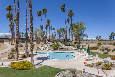 This condo features a premium location with lake, fairway and on Palm Royale Country Club in California - for sale on GolfHomes.com, golf home, golf lot