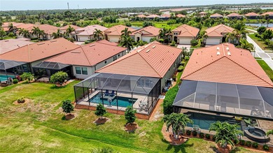 If you ever wanted to live on a golf course, then this home is on Sarasota National Golf Club in Florida - for sale on GolfHomes.com, golf home, golf lot
