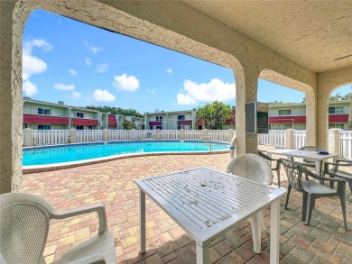 Location, Location, Location! This unit is right by the Pool on Cove Cay Country Club in Florida - for sale on GolfHomes.com, golf home, golf lot