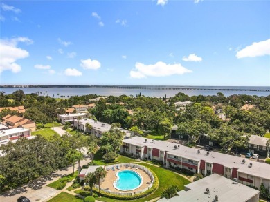 Location, Location, Location! This unit is right by the Pool on Cove Cay Country Club in Florida - for sale on GolfHomes.com, golf home, golf lot