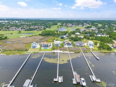 Experience unparalleled luxury in this custom-built 4,000 sq. ft on Tiger Point Golf and Country Club in Florida - for sale on GolfHomes.com, golf home, golf lot