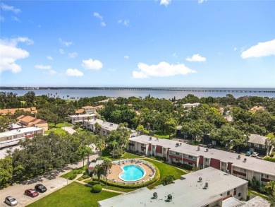Location, Location, Location! This unit is right by the Pool on Cove Cay Country Club in Florida - for sale on GolfHomes.com, golf home, golf lot