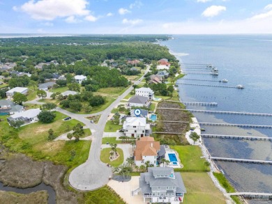 Experience unparalleled luxury in this custom-built 4,000 sq. ft on Tiger Point Golf and Country Club in Florida - for sale on GolfHomes.com, golf home, golf lot