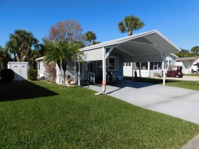 This is a wonderful 1 Bedroom 1 Bath and Bonus Room with laundry on The Great Outdoors Golf and Country Club in Florida - for sale on GolfHomes.com, golf home, golf lot