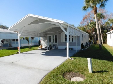 This is a wonderful 1 Bedroom 1 Bath and Bonus Room with laundry on The Great Outdoors Golf and Country Club in Florida - for sale on GolfHomes.com, golf home, golf lot