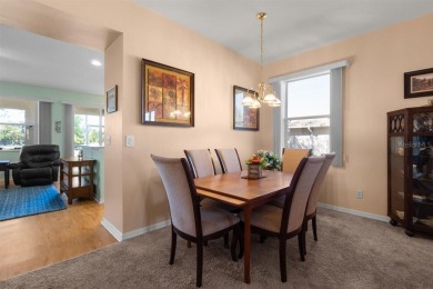 Welcome to this charming three-bedroom, two-bathroom home with a on Deep Creek Golf Club in Florida - for sale on GolfHomes.com, golf home, golf lot