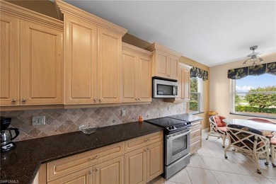 Rarely available end unit offering 2 Beds 2 Baths + DEN with on Heritage Palms Golf and Country Club in Florida - for sale on GolfHomes.com, golf home, golf lot