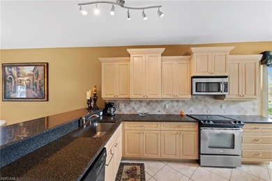 Rarely available end unit offering 2 Beds 2 Baths + DEN with on Heritage Palms Golf and Country Club in Florida - for sale on GolfHomes.com, golf home, golf lot