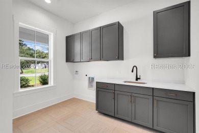 Set on nearly half an acre, this 3 bedroom, 2.5 bath home on Hampton Pointe Golf Course in South Carolina - for sale on GolfHomes.com, golf home, golf lot